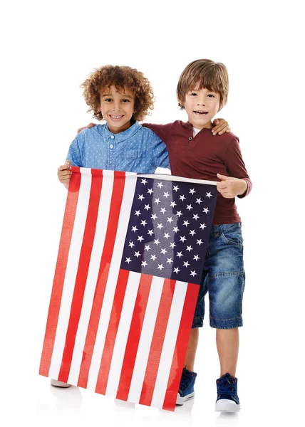 Proud American Studio Shot Two Cute Little Boys Holding American Royalty Free Stock Photos