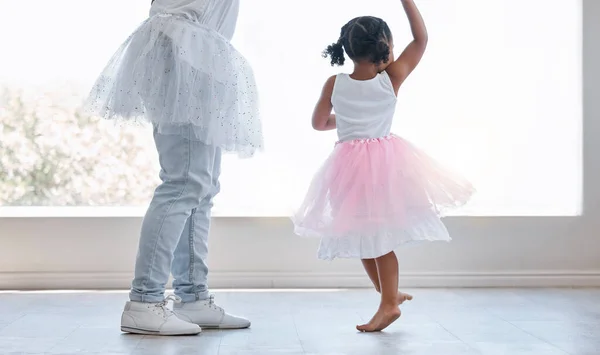 Dance and love with father and daughter family together in a princess dress for support, childhood and happiness. Care, fun and lifestyle with dad dancing ballet with young child in family home.