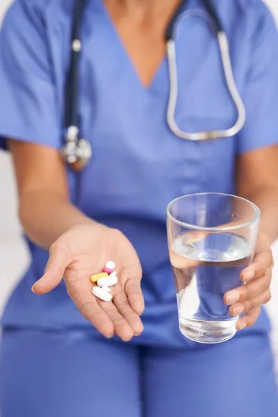 Take Two Daily Water Cropped Image Doctor Holding Pills Glass — Stock Photo, Image