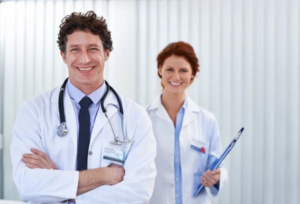 Successful Day Immunisations Two Happy Doctors Standing Together Clinic — Stock Photo, Image