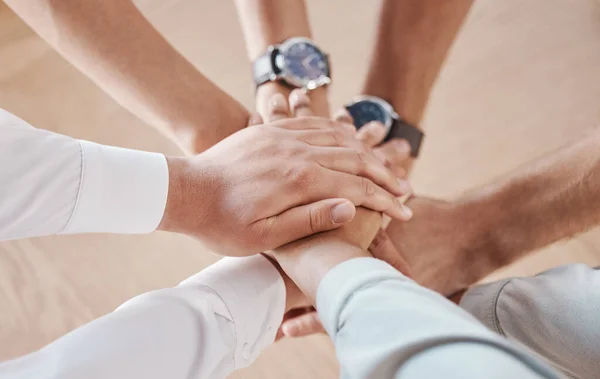 Business people, hands and team building motivation in support, trust and collaboration circle in office. Zoom on diversity men, planning women or global company meeting with goal and innovation idea.