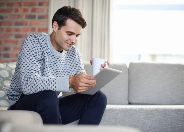 Reading His Morning News Tablet Young Man Using His Laptop — Stock Photo, Image