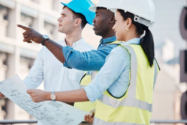 Architect, blueprint or building engineer meeting or planning architecture design strategy. Team diversity, construction teamwork or property leader with real estate innovation, vision or design.