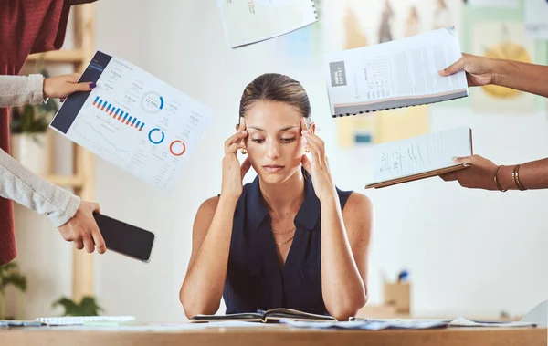 Stress, headache and burnout with business woman feeling overwhelmed by a busy schedule and deadline in an office. Corporate employee suffering anxiety and mental breakdown from workload and tasks.