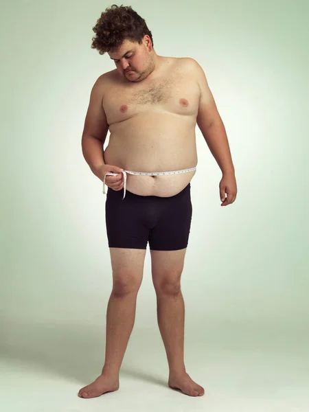 Maybe Gluten Intolerant Man Measuring His Overweight Belly — Stock Photo, Image