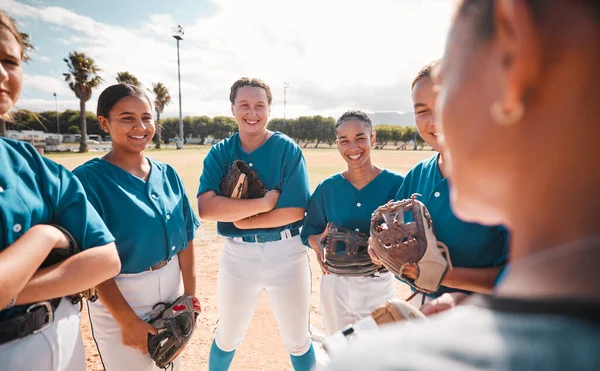 Team of women baseball players, given strategy and motivation by coach to win game. Winning in sport means leadership, teamwork and pride as well as healthy competition for group victory in softball.