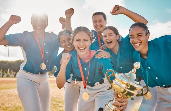 Winner, success and trophy with women baseball team in celebration at park field for sports, teamwork and champion. Achievement, motivation and happy group of players winning sport game together.