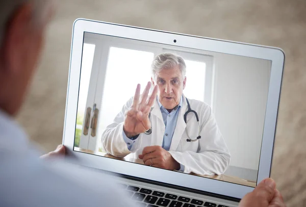 Medical video call, doctor consulting and man in communication with healthcare expert about health, planning surgery online and talking about medicine. Person in telehealth meeting with surgeon.