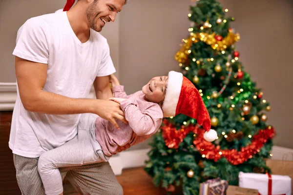 Holiday Bonding Moments Father Tickling His Son Next Christmas Tree — Stock Photo, Image
