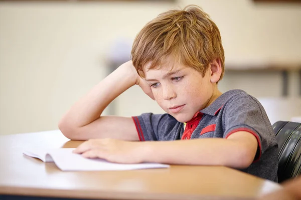 Classroom Contemplations Young Student Focused His Work While Sitting His — Stock Photo, Image