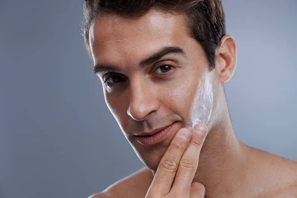 Even Men Soft Studio Shot Handsome Young Man Applying Cream — Stock Photo, Image