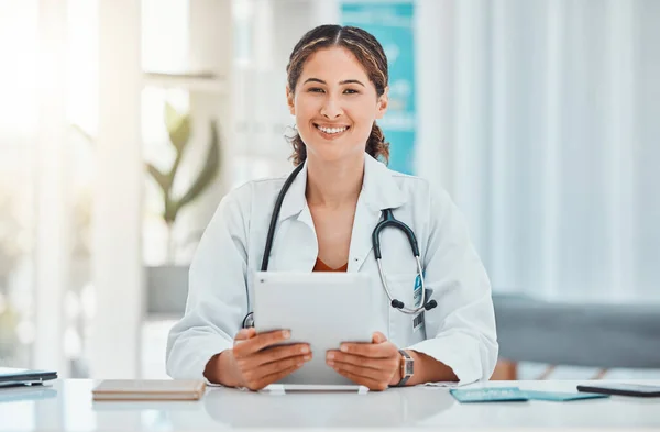 Hospital, doctor and portrait with tablet in office for medical analysis research work online. Canada healthcare woman in consulting workplace with expert knowledge and professional advice
