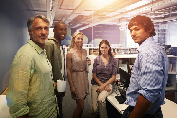 The team you can trust. Cropped portrait of a group of businesspeople standing in their office