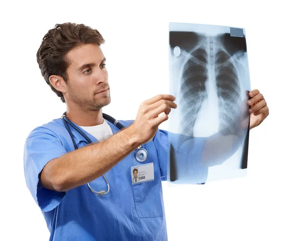 专注于寻求治疗 一位年轻貌美的医生正在给他做X光检查的摄影棚照片 — 图库照片