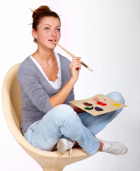 Come Imagination Thoughtful Looking Young Woman Sitting Chair Holding Paintbrush — Stock Photo, Image