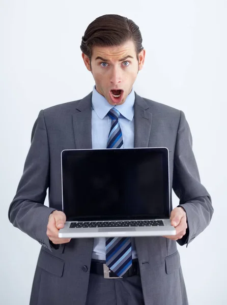 Jaw Dropping Young Businessman Presenting Laptop You Excitedly Royalty Free Stock Photos