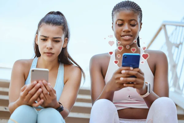 Social network, smartphone and fitness women friends or influencer partner with love emoji notification graphic icon. Sports girl on social media confused with algorithm update and digital connection.