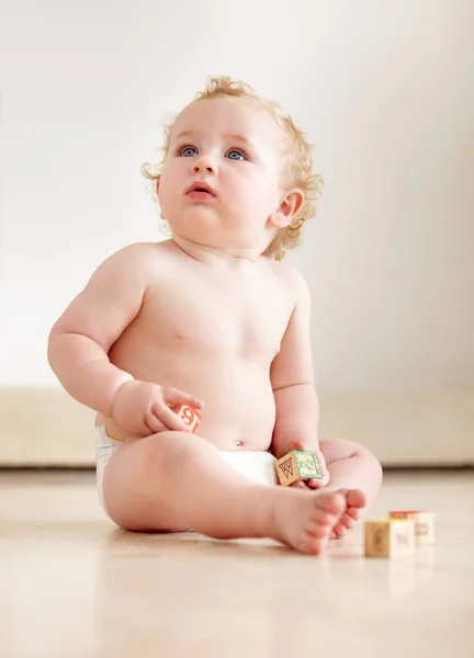 Whats Childhood Curiousity Cute Baby Boy Looking Curiously While Sitting — Stock Photo, Image