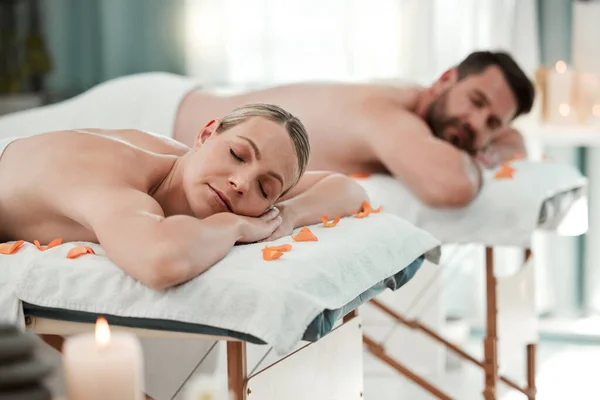 Spa, massage and couple relax for health and wellness therapy massage table, zen, care and calm. Luxury, beauty and man and woman enjoy relaxing treatment on vacation in Thailand, happy and peaceful.