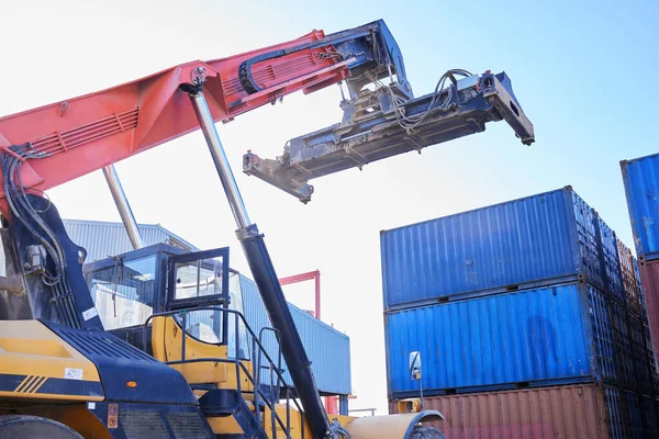 Crane, box container and delivery cargo shipping business company in manufacturing, shipping and distribution of stock. Industrial freight machine transport truck export supply chain courier package.