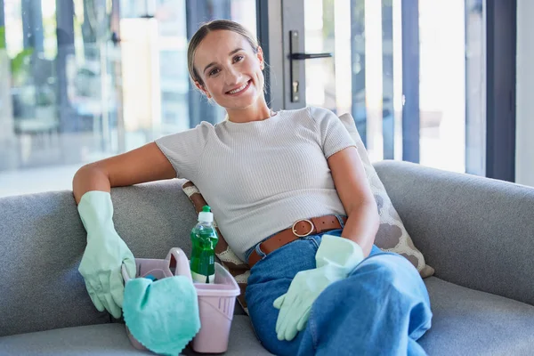 Sofa, cleaning service and business woman in portrait with cleaner product basket and house living room work with home trust. Entrepreneur, small business owner or startup for clean success career.