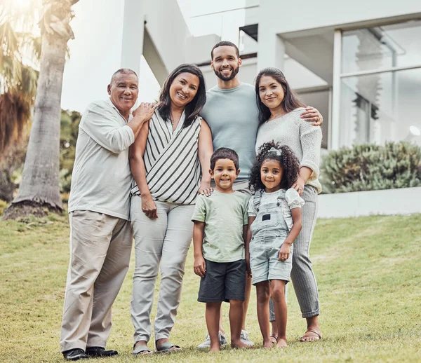 Big family, parents or children bonding in new house garden after mortgage loan, home finance or real estate investment. Portrait, smile or happy kids with senior grandparents with property insurance.