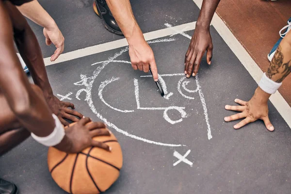 Coaching, basketball or USA sport team coach planning and talking about strategy for event game on basketball court. Athlete sports students in communication for idea in exercise, training or workout.