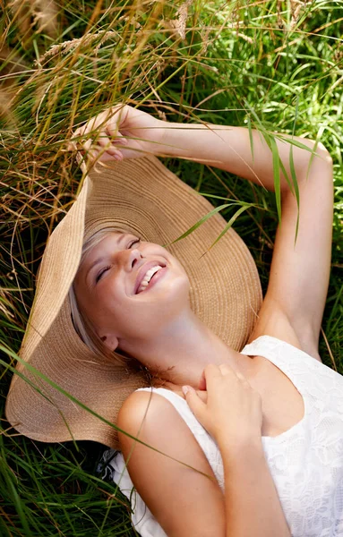 Enjoying Carefree Summers Day Beautiful Young Woman Sunhat Lying Tall Royalty Free Stock Images