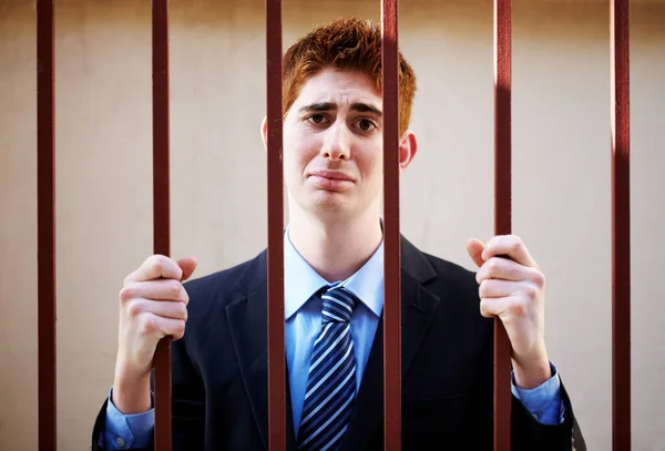 Bad business has its consequences. An unhappy businessman behind bars