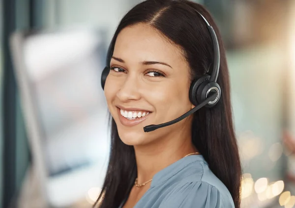 Customer service, corporate portrait of woman in telemarketing business working in office. Professional helpdesk support operator girl working in consulting career with confident smile