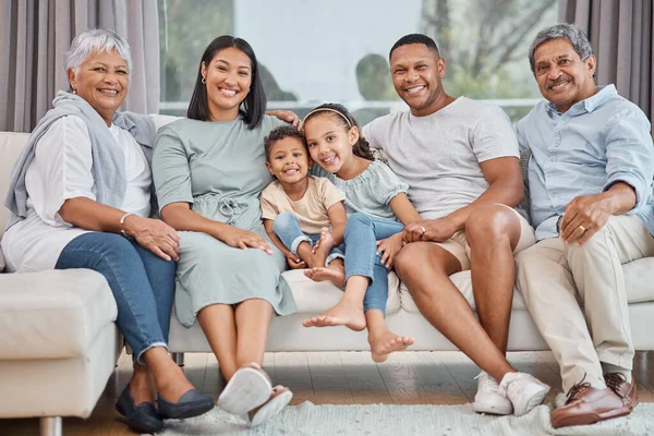 Happy Affectionate Young Mixed Race Family Six Sitting Sofa Home — ストック写真