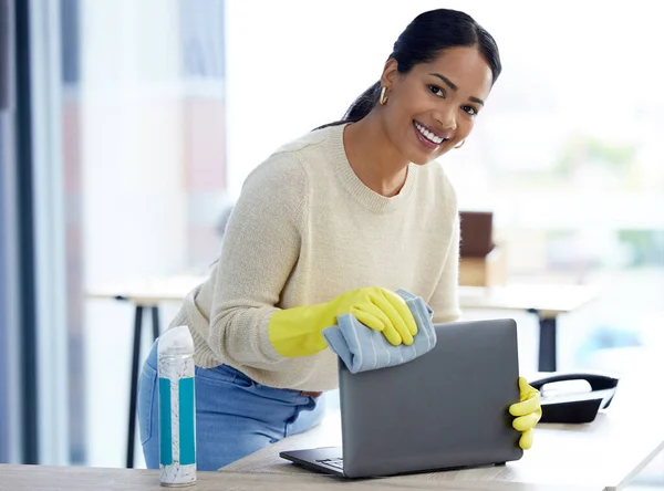 Laptop, cleaning service and woman office portrait product, dust cloth and spray bottle for company health, trust and care. Entrepreneur, startup or small business owner happy with cleaner job work.