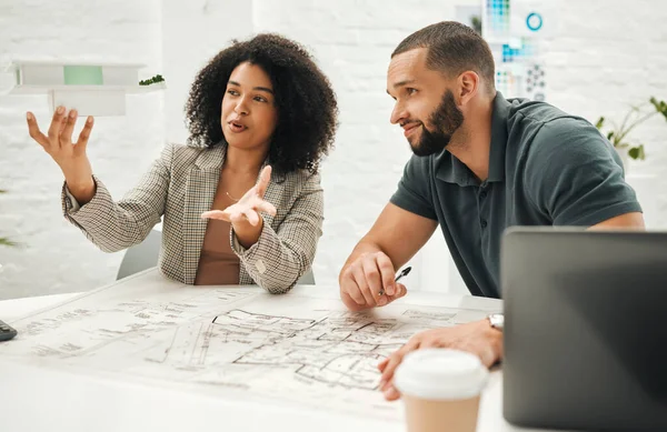 architect coworkers planning a building together. Businesspeople working on an architectural project together. Team of engineers collaborate on a 3D building model. Designers work on building model.