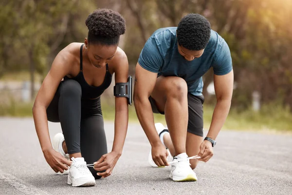 A woman and a man in fitness running clothes. Physical education together,  family couple healthy lifestyle. People workout trainer use fitness watch  and app for exercise results. 31603778 Stock Photo at Vecteezy