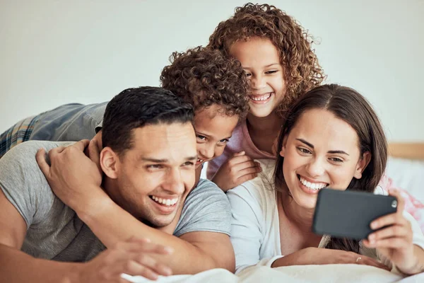 Young Happy Mixed Race Family Smiling Selfie Lying Bed Together — Φωτογραφία Αρχείου