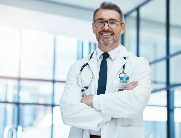 Healthcare, innovation and doctor in portrait for trust, research leadership and health insurance in a hospital or clinic. Medical expert worker senior man for goal, motivation and happy with career.