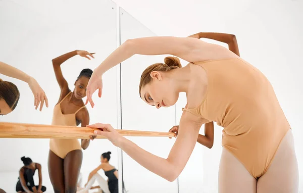 Do you feel your music. a group of ballet dancers practicing a routine