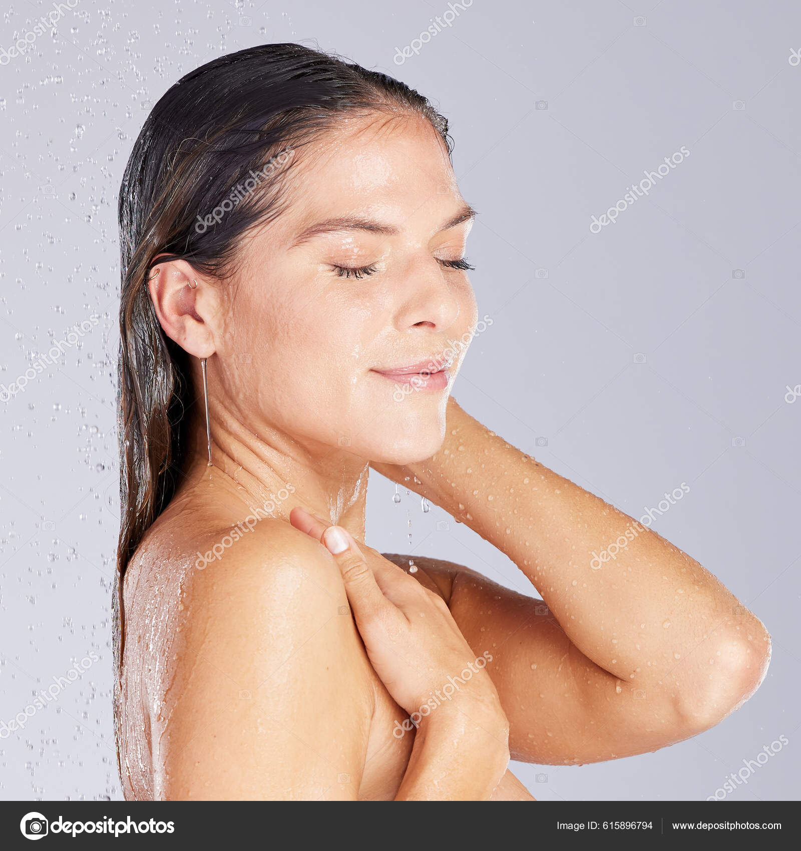 Hot Shower Relaxes Your Muscles Too Studio Shot Attractive Young Stock Photo by ©PeopleImages