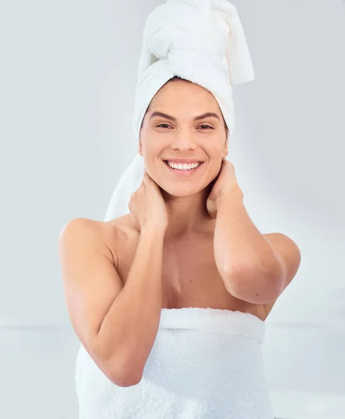 I love taking the time to care for myself. a young woman in her bathroom