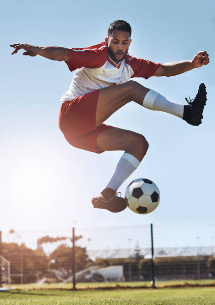 Soccer kick trick, football and man athlete from Israel on a sport field outdoor with motivation. Fitness, exercise and training workout of a person ready for a sports game, cardio and play energy.