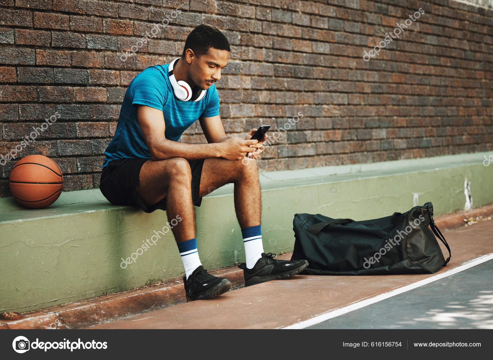 Jogador de basquete ouvindo música