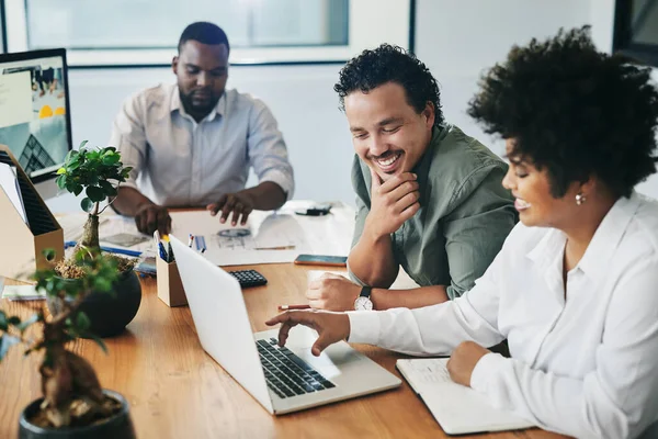 Do you need some help with that. a group of young businesspeople having a discussion in an office