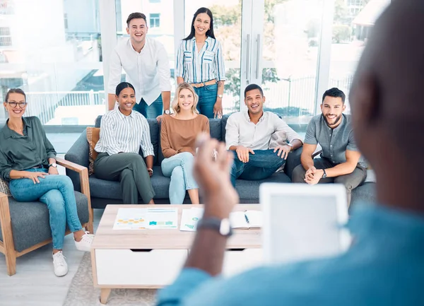 Presentation, tablet and business people in meeting with the ceo planning, talking and speaking of our vision and mission. Leadership, mentor and African boss coaching employees on marketing skills.