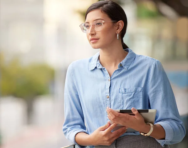 I hope I get a good reply. a young businesswoman using her smartphone to send text messages