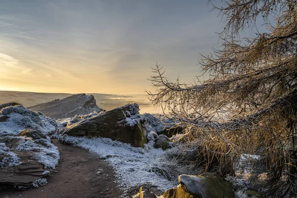 Temperature inversion at The Roaches at sunrise during winter in the Peak District National Park.