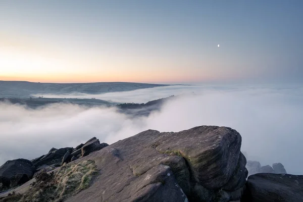 Temperature inversion at The Roaches at sunrise during spring in the Staffordshire, Peak District National Park, UK.