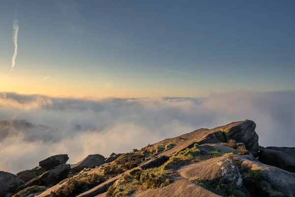 Temperature inversion at The Roaches at sunrise during spring in the Staffordshire, Peak District National Park, UK.