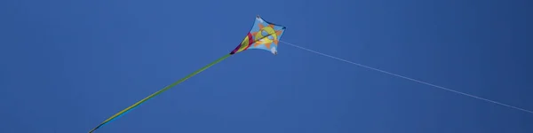 Image Colorful Kite Flying High Sky Drawing Smiling Sun Rainbow — Stockfoto