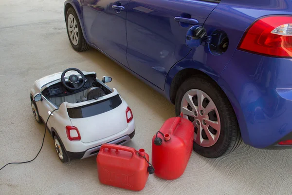 Picture Small Electric Car Children While Charging Battery Diesel Car — Stock fotografie