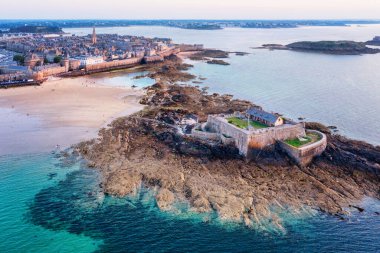 Aerial view of St Malo town walls and the National Fort on atlantic coast of Brittany, France